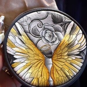 Anuschka had painted coin purse